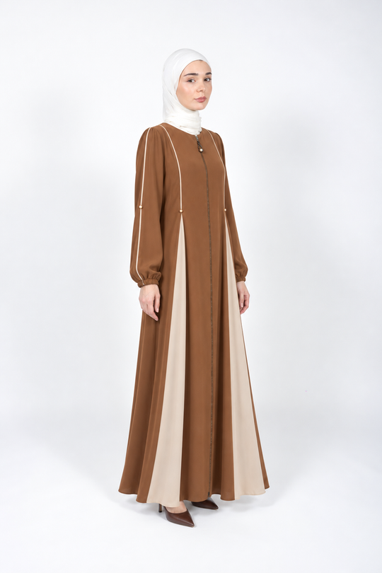 Cumin abaya with cream flared panels, three-quarter view