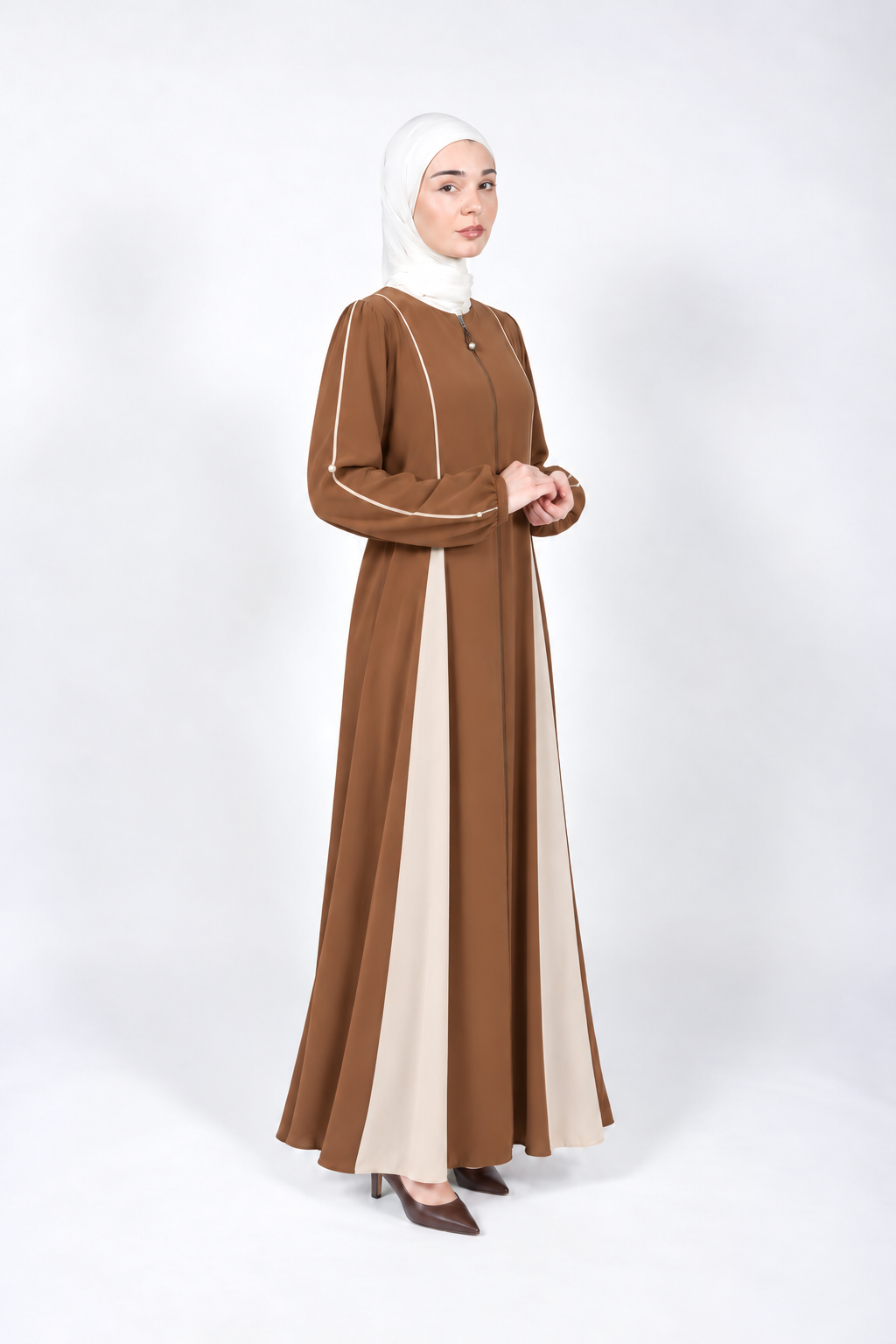Cumin abaya with cream piping and full-length front zip, front view