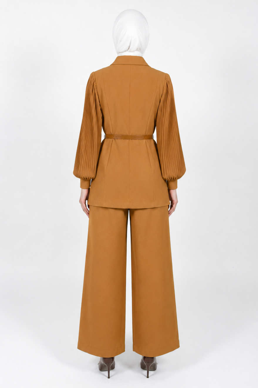 A mannequin wearing a matching two-piece suit in a warm camel brown color, shown from the back against a plain white studio background.